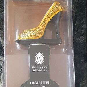 Gold heel wine stopper. New